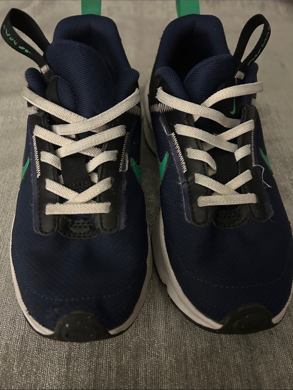 Nike Kids Navy Sneakers with Green Swoosh and White Laces